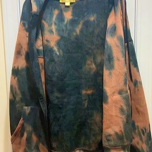 This is a sweater that has butterflies on it and it’s really soft from inside